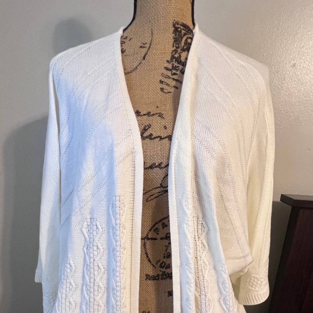 White cardigan sweater with tassels